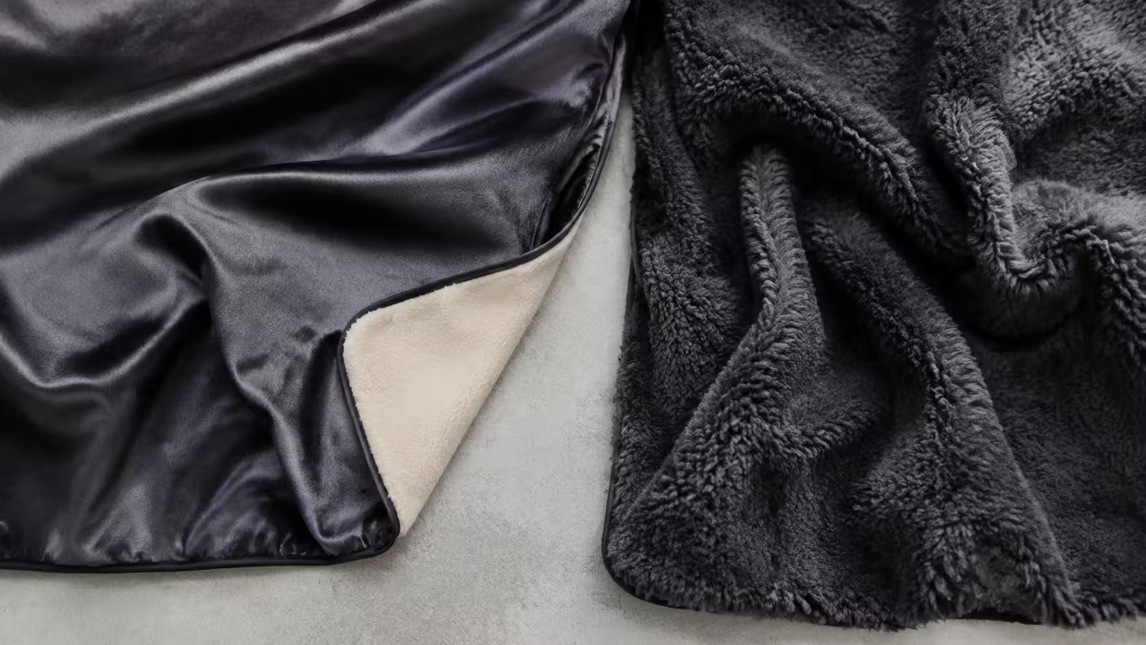 Satin car cover fabric with fleece lining next to a thick plush fleece car cover fabric